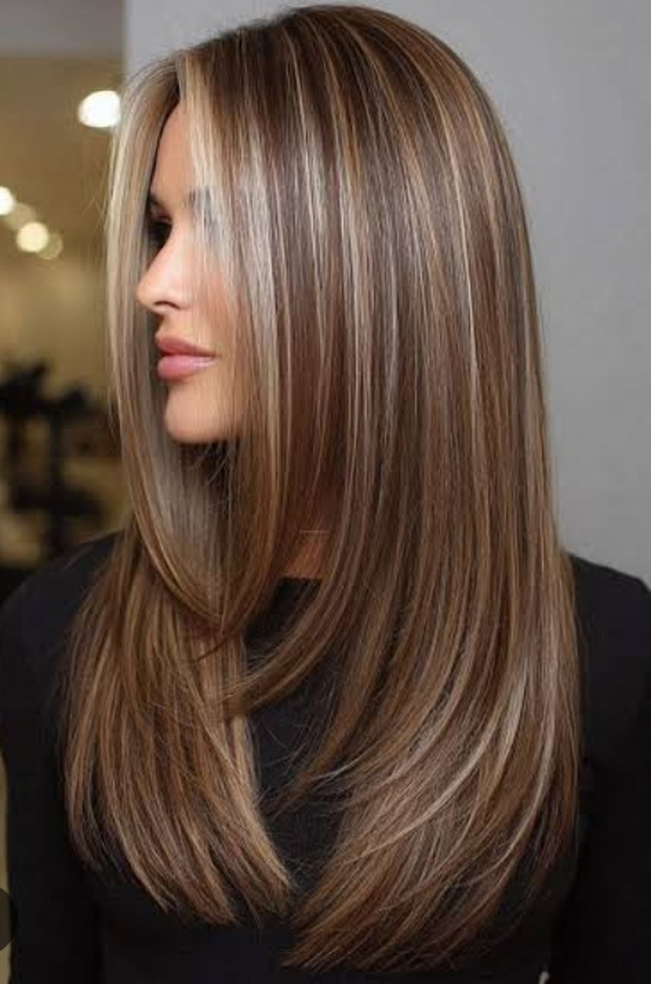 Full highlights on long hair, lightened through the mid-lengths and ends
